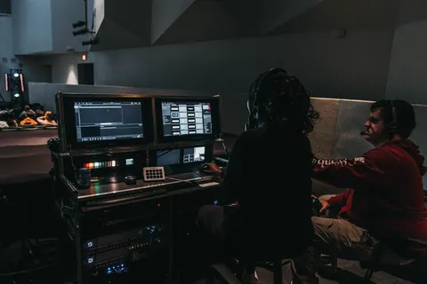 Production volunteers at the control desk overlooking the auditorium at Radiant Church’s New Tampa location.