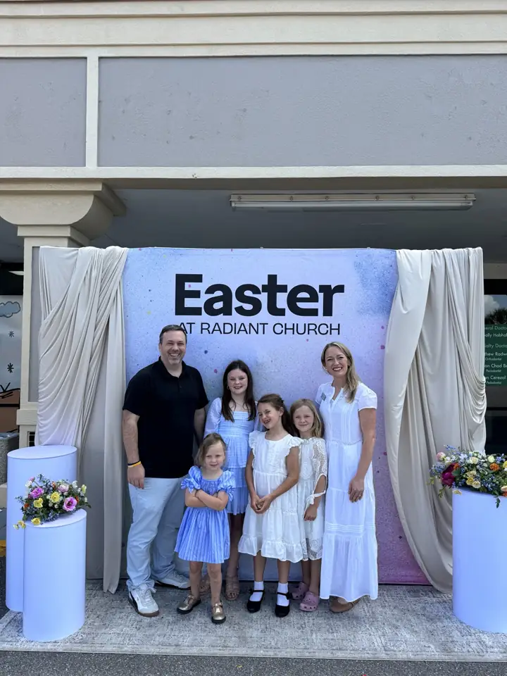 Sam and Delia Cornwell with their four daughters at church